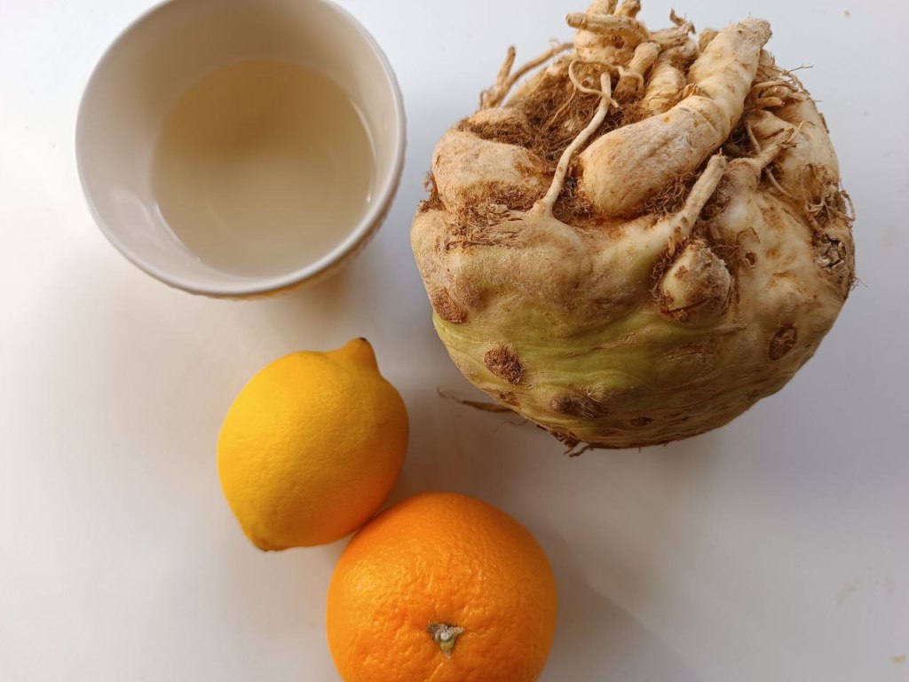 Sedano rapa con arancia, limone e birra, per le scaloppine